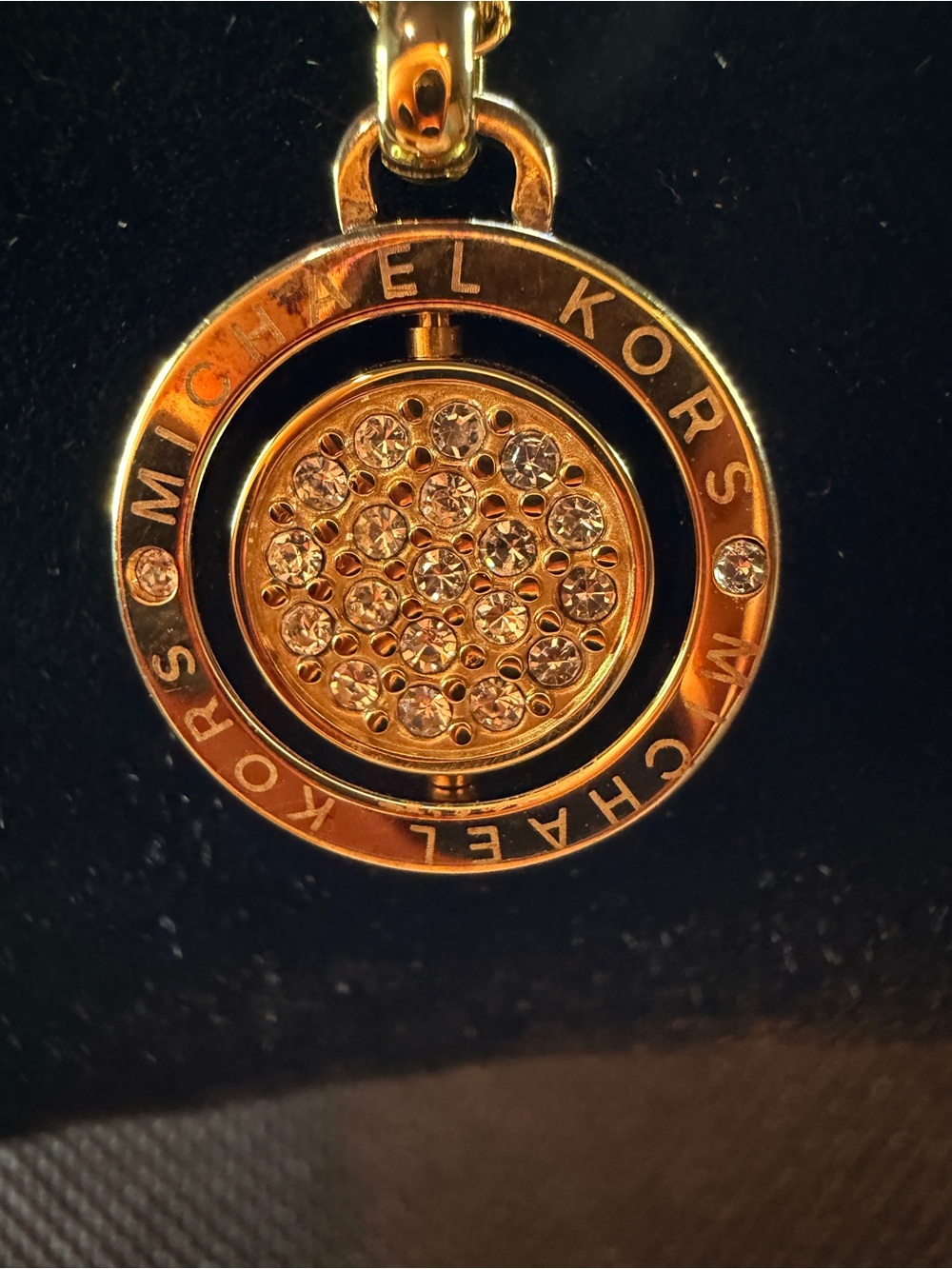 Michael Kors Gold Circle Flip necklace